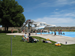 Kids playing the water by a water slide