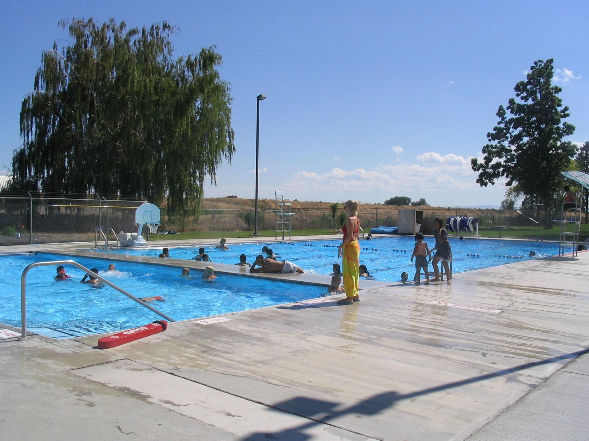 Divided pool with children playing in it